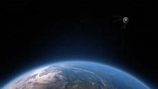 A view of Earth from space with a satellite flying overhead