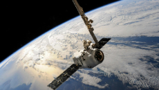 satellite flying over Earth