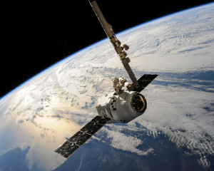 Satellite flying over Earth
