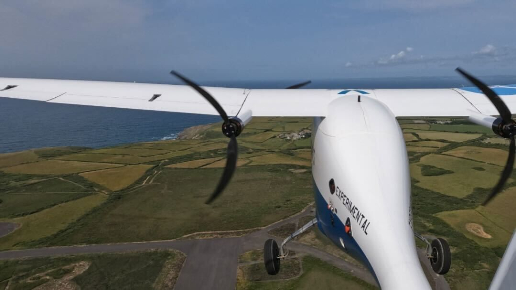 UAV flying in the air over fields and roads