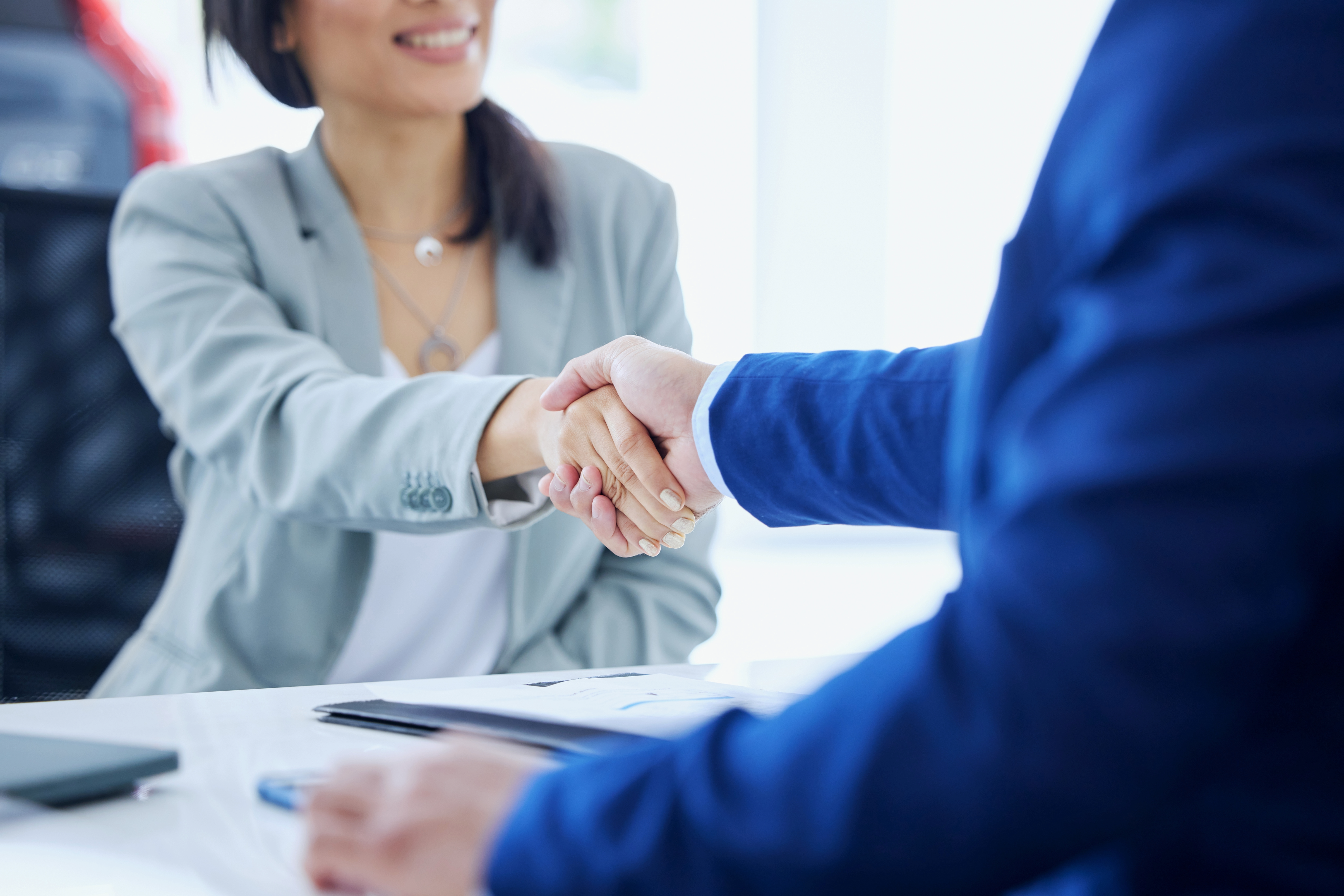 Two people shaking hands
