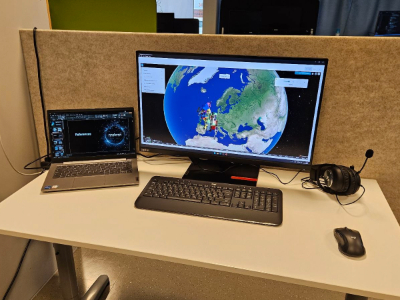 Person using laptop to look at simulation of Inter-Satellite Links