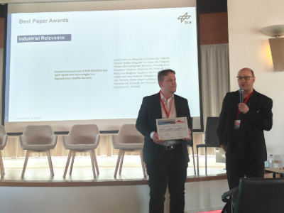 Magisterians at conference, presenting our simulations on a computer screen